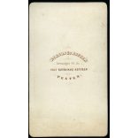 Borsos és Doctor műterem, Pest, fiatal férfi köpenyben, csokornyakkendő, kucsma, sapka, csizma, monarchia, 1860-as évek, Eredeti CDV, vizitkártya fotó.   