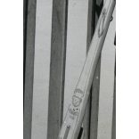 Fiú Steiff fa rolleren, Budapest, Horthy (Petőfi) híd, városkép, játék, jármű, közlekedés, levente (?) egyenruha, Horthy-korszak, 1939, 1930-as évek, helytörténet. Eredeti fotó, papírkép, hátulján rag